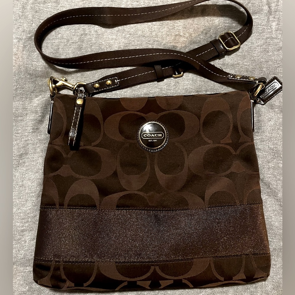 Coach purse. Brown with gold hardware. Classic C pattern.